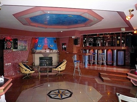 private party hall with bar, fire place, home cinema, electronic dartboard, table tennis