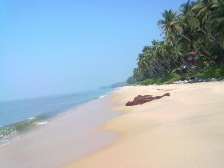 The clean uncrowded sandy beach just in front of Ocean Hues Beach House